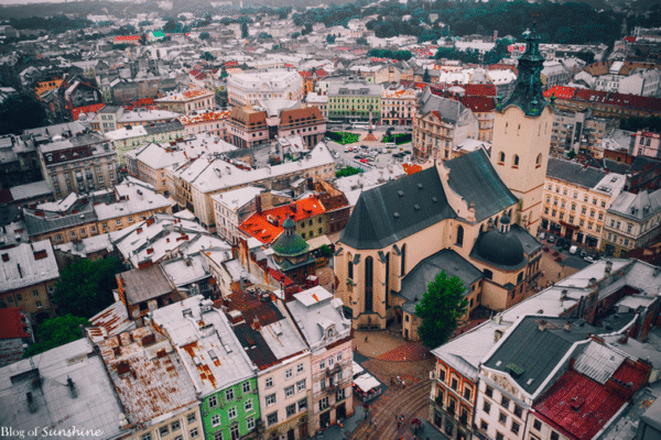 Aerial view of Dominican Cathedral and colorful rooftops in Lviv’s historic city center, Ukraine