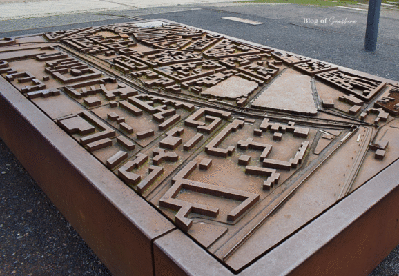 Bronze 3D model of Berlin’s city layout at the Berlin Wall Memorial, showing the division and street structure near Bernauer Straße