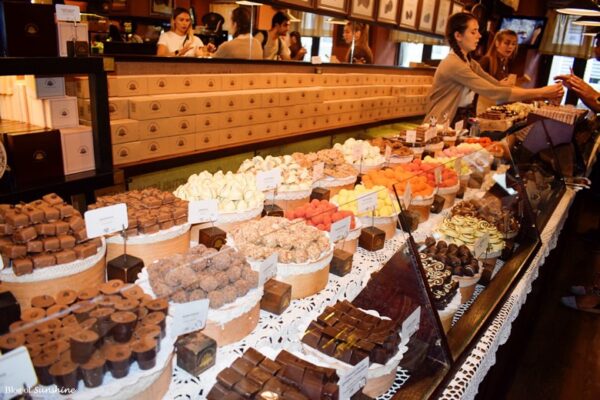 Colorful display of handmade chocolates and truffles at a chocolate shop in Lviv, Ukraine
