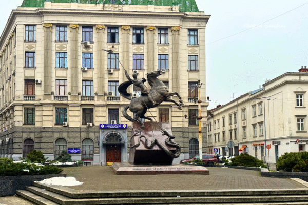 St. George monument in Lviv, Ukraine, showing the saint on horseback slaying a dragon in front of the Lviv Polytechnic University building.