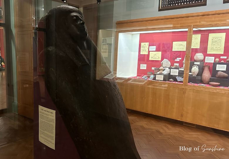 Ancient Egyptian sarcophagus exhibit with artefacts at Cliffe Castle Keighley