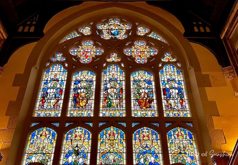 Close-up of ornate stained glass window above the grand staircase at Cliffe Castle Keighley