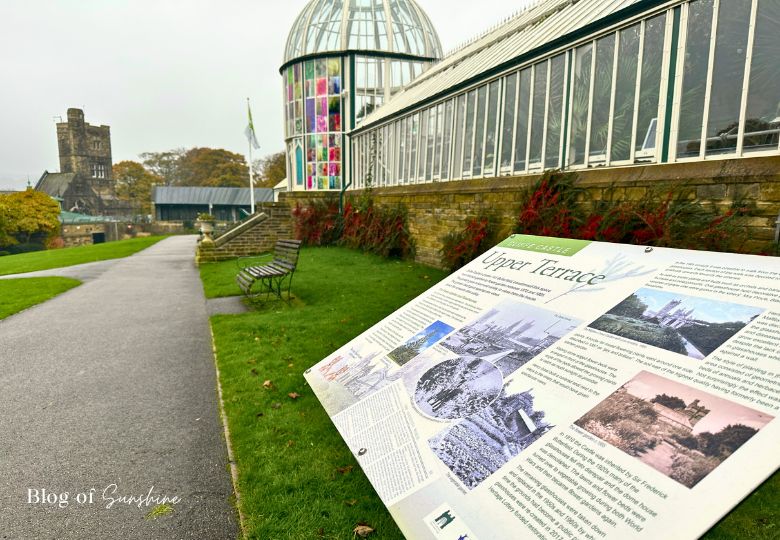 Information sign and view of the Upper Terrace glasshouse at Cliffe Castle Keighley