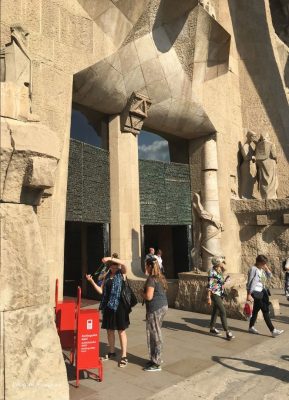 Tourists collecting audio guides at the Sagrada Família entrance