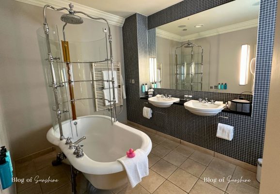 Spacious bathroom in the Seaham Hall Garden Suite with Hot Tub with a deep bath and double sinks