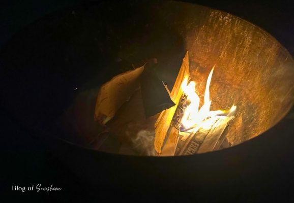Fire pit lit at night in the private garden of the Seaham Hall Garden Suite