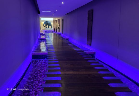 Lit underground walkway from Seaham Hall Hotel leading to Serenity Spa in County Durham