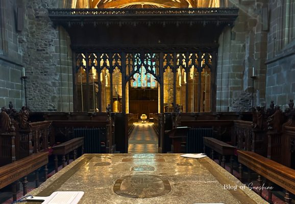 View through the carved wooden screen inside St John the Baptist Church Tideswell near Buxton