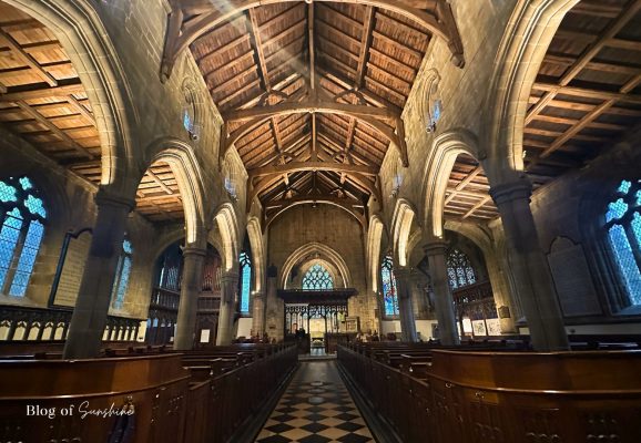 Wide view down the nave inside St John the Baptist Church Tideswell near Buxton