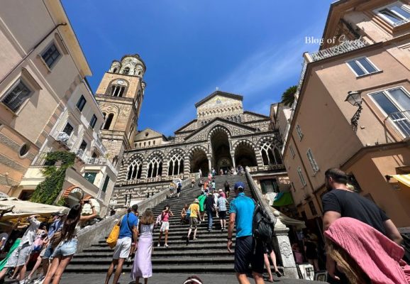 Visitors walking up the steps to Amalfi Cathedral in Piazza del Duomo on the Amalfi Coast