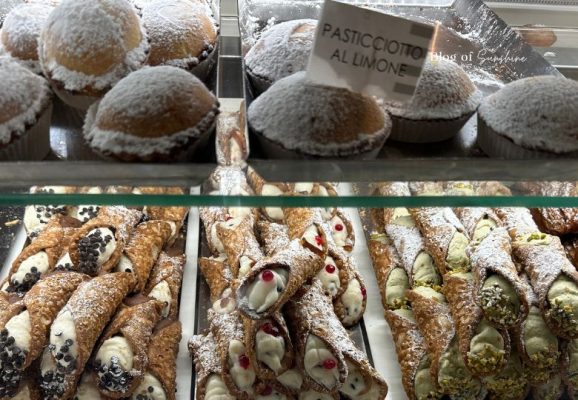 Italian pastries and cannoli on display at a bakery on the Amalfi Coast
