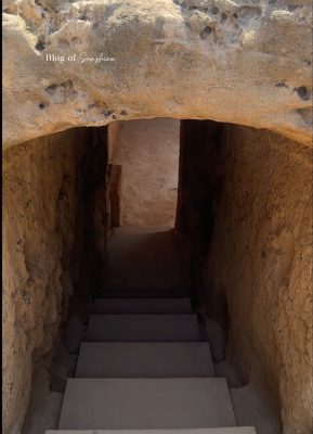 Stone steps leading down into Tomb 3 at Tombs of the Kings in Paphos Cyprus